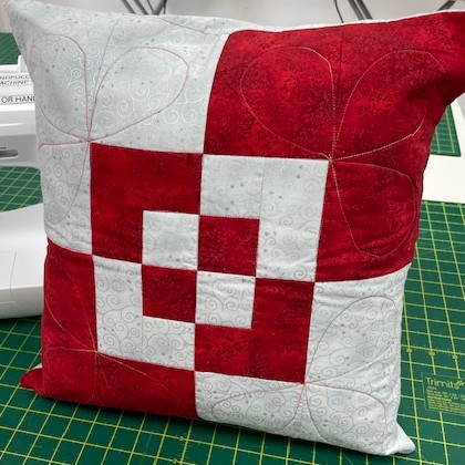 quilt block made into a cushion cover