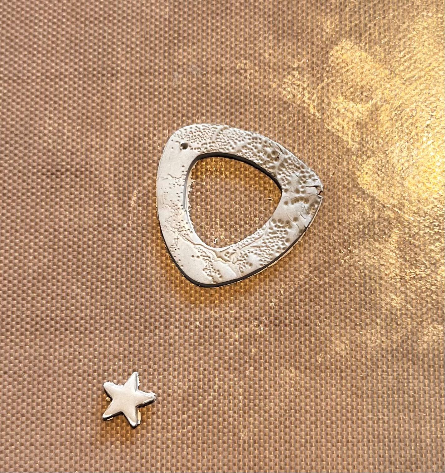 cut out piece of silver clay