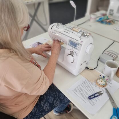 lady using a sewing machine