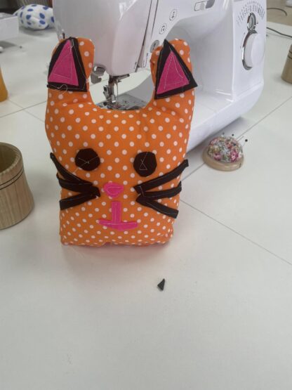 Handmade mini worry monster made by hand during a sewing workshop