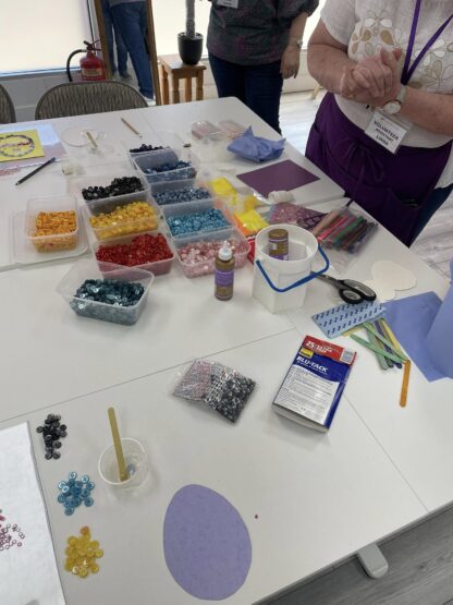 Photo of buttons on a table in a workshop