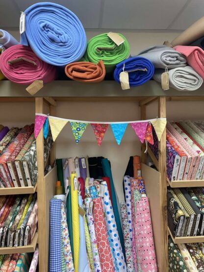 A shop showing some handmade bunting hung up