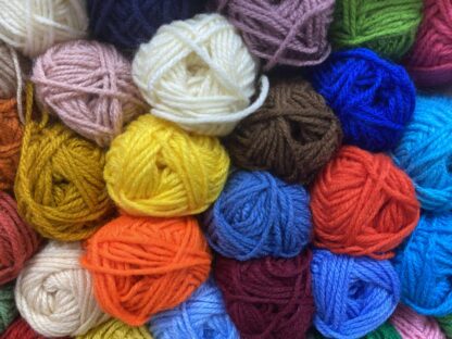 Balls of different coloured yarn
