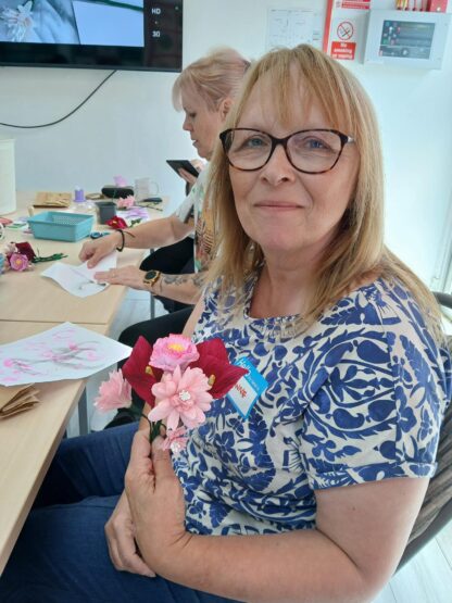 Lady with paper crafted flowers