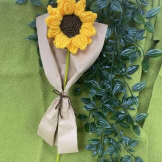 Crocheted Sunflower wrapped in paper