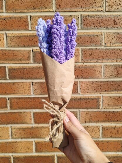 Bunch of hand made lavender sprigs, crocheted, and wrapped in brown paper