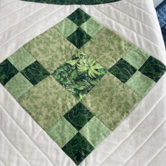 Quilting Block showing a 9 Patch layout