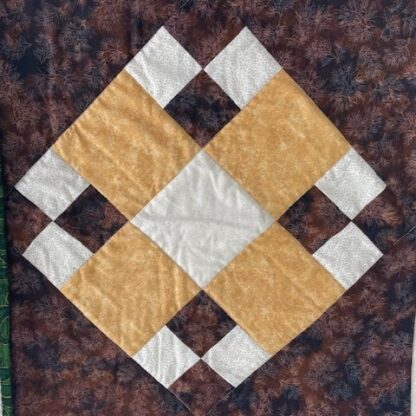 quilting block showing a different 9 patch layout