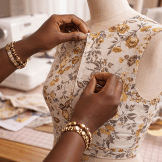 pinning clothing onto a mannequin on a sewing workshop at sew mindful crafts