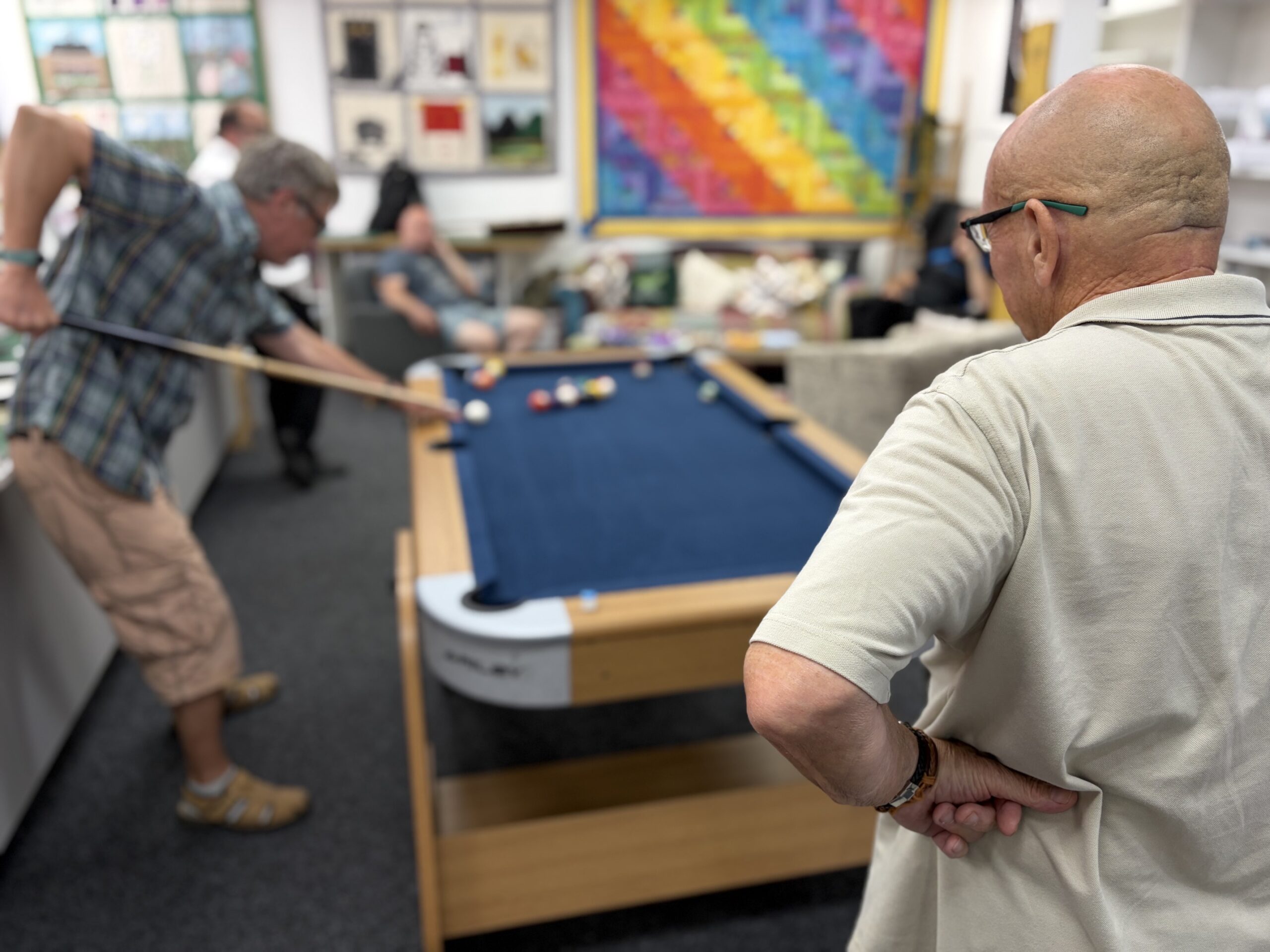2 guys playing pool