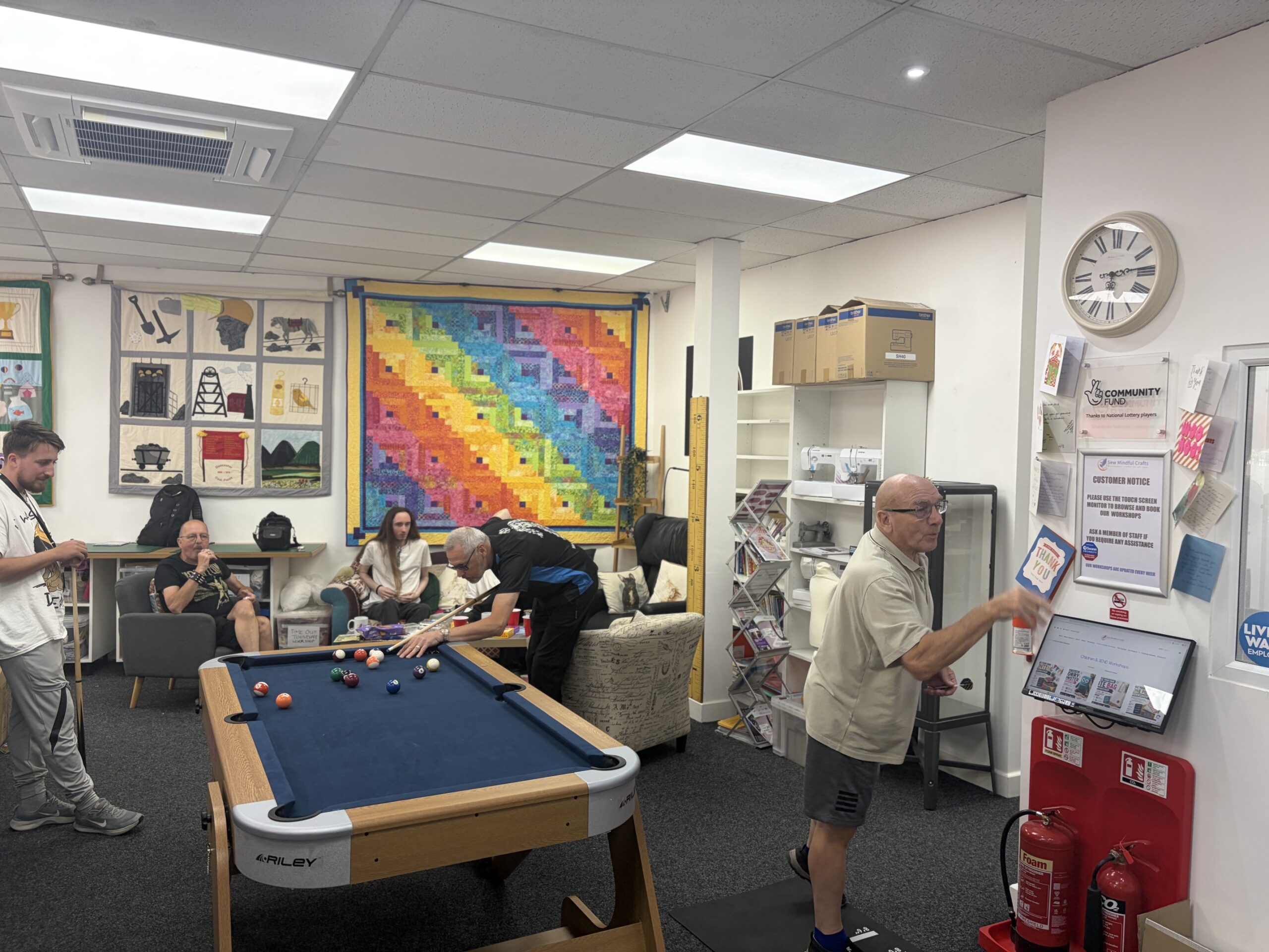 guys playing pool and darts